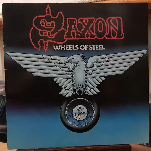 Saxon – Wheels Of Steel (LP, Album) (Very Good Plus (VG+))